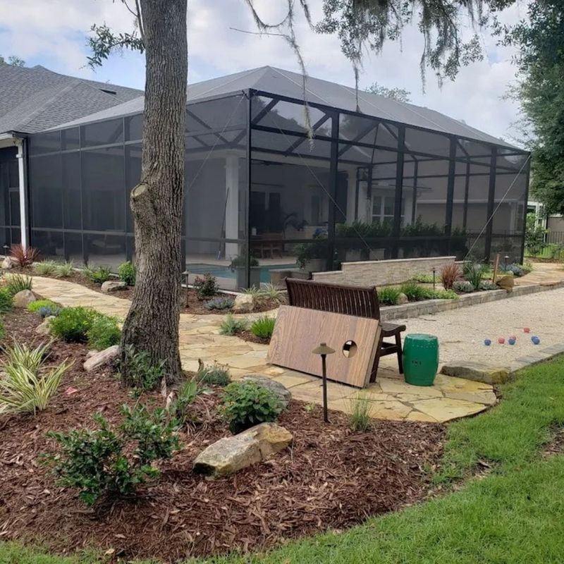 a bocci ball pit near a pool